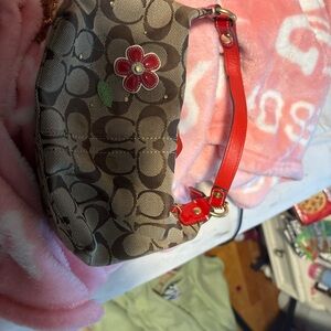 Small Floral Patterned Coach Handbag with Red Strap